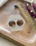 Round pebble studs with a faux stone texture