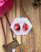 Small pebble faux stone stud earrings in pink and red