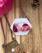 Large faux stone triangle stud earrings in red and pink
