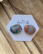 Round pebble studs with a faux stone texture