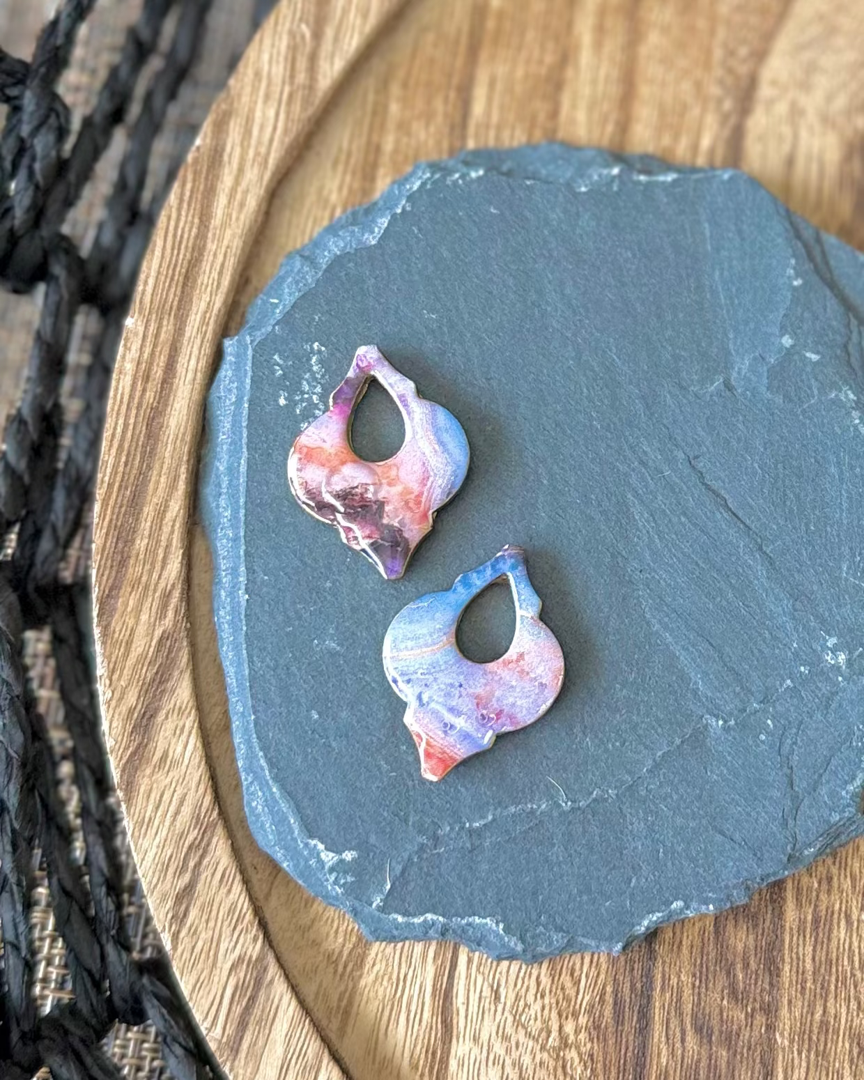 Moroccan style charm earrings with teardrop keyhole and blue and purple marble design.